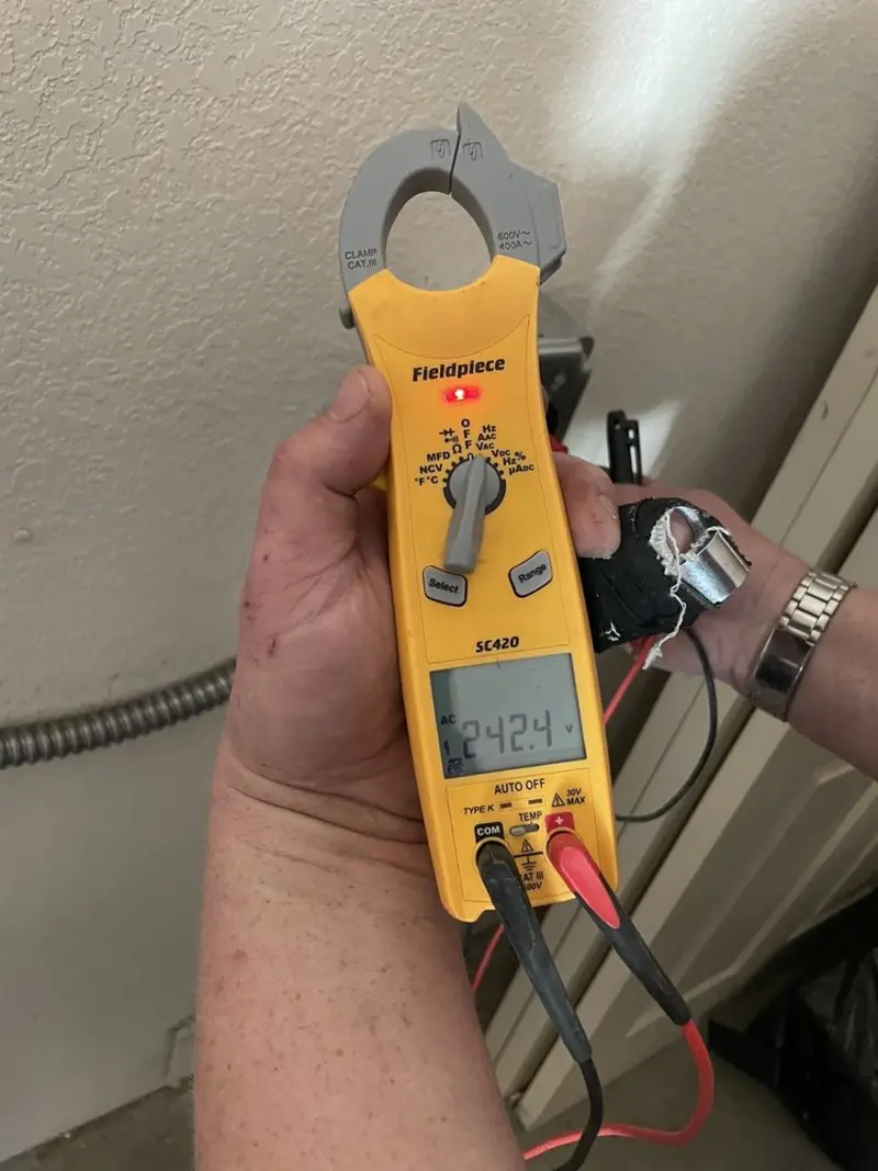 Voltage testing with clamp meter during Hot Tub / Pool Electrical Wiring in Marysville